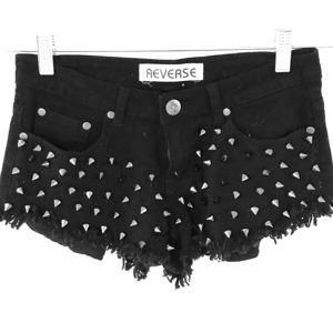 Reverse brand Jean shorts with studs.
